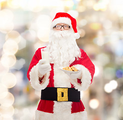 Image showing santa claus with glass of milk and cookies