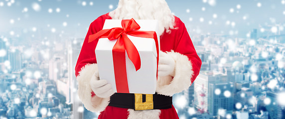 Image showing man in costume of santa claus with gift box