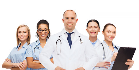 Image showing group of smiling doctors with clipboard