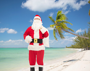 Image showing man in costume of santa claus with bag