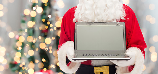 Image showing close up of santa claus with laptop