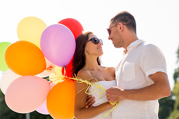 Image showing smiling couple in city