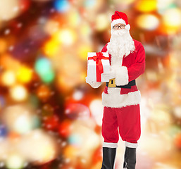 Image showing man in costume of santa claus with gift box