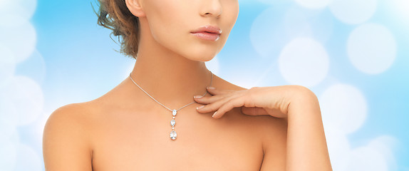 Image showing woman wearing shiny diamond pendant