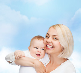 Image showing happy mother with smiling baby