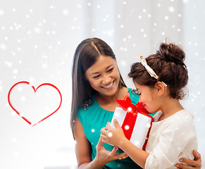 Image showing happy mother and child girl with gift box