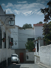 Image showing Mountains Over a Street