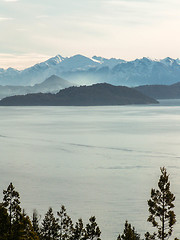 Image showing Lake And Misty Snowy Mountain