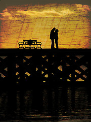 Image showing Kissing Couple Silhouette On A Pier