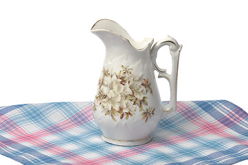 Image showing Old flower vase on cloth