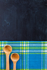Image showing wooden spoons and tablecloth 