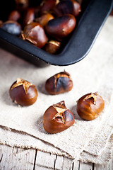 Image showing roasted chestnuts in a pan