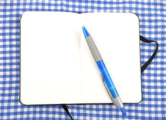 Image showing Notebook on cloth