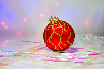 Image showing Red Christmas ball on the table