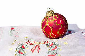 Image showing Red Christmas ball embroidered napkin isolated