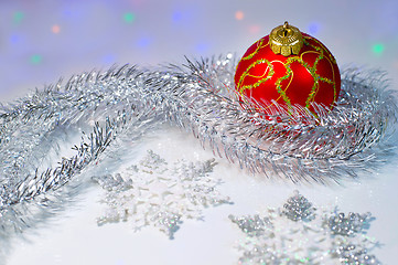 Image showing Christmas ball, tinsel and snowflakes