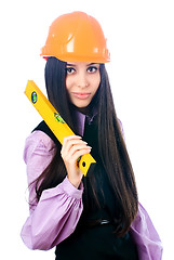 Image showing Attractive girl in helmet with level