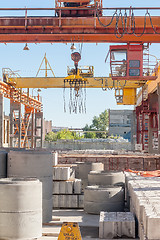 Image showing Operator of crane works at finished good warehouse