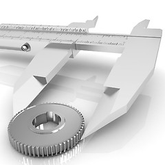 Image showing Vernier caliper measures the cogwheel 