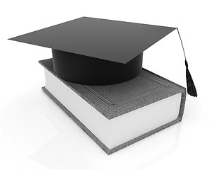 Image showing Graduation hat on a leather book