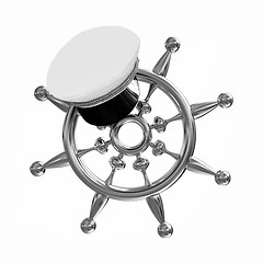 Image showing Marine cap on gold marine steering wheel 