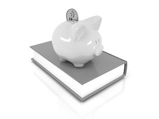 Image showing Piggy Bank with a gold dollar coin on book.