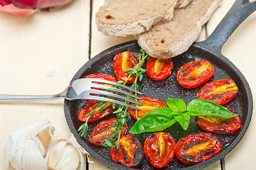 Image showing baked cherry tomatoes with basil and thyme