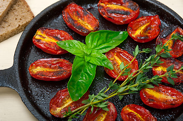 Image showing baked cherry tomatoes with basil and thyme