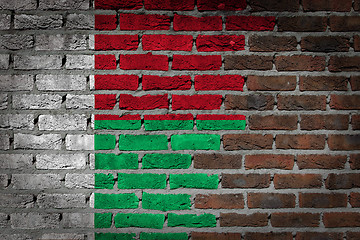 Image showing Brick wall texture with flag