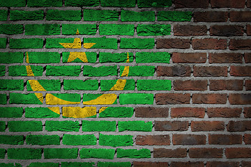 Image showing Brick wall texture with flag