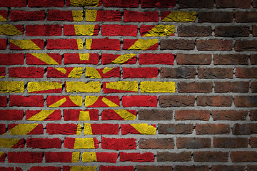 Image showing Brick wall texture with flag