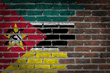 Image showing Brick wall texture with flag