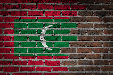 Image showing Brick wall texture with flag