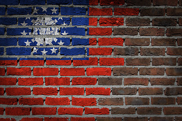 Image showing Brick wall texture with flag