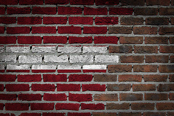 Image showing Brick wall texture with flag