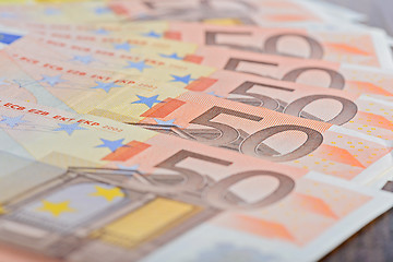 Image showing Close-up of 50 Euro banknotes on the table