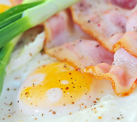 Image showing breakfast with bacon and fried eggs