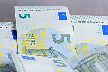 Image showing Close-up of 5 Euro banknotes