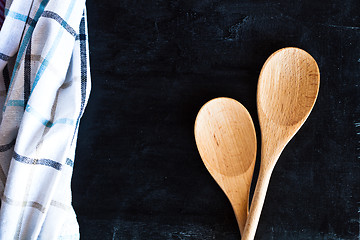 Image showing wooden spoons and tablecloth