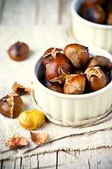 Image showing roasted chestnuts in bowls 