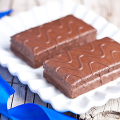 Image showing dark chocolate cakes on a plate