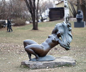 Image showing Statue of a girl standing in the park