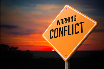 Image showing Conflict on Warning Road Sign.