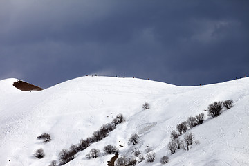 Image showing Off piste slope and overcast sky in windy day