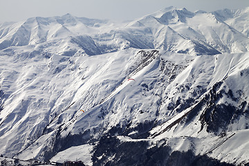 Image showing Paragliders of snowy mountains