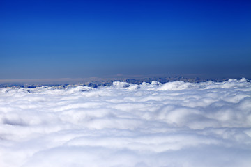 Image showing Mountains under clouds in sun day