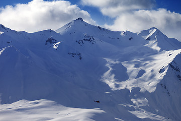 Image showing Off piste slope for heliskiing and helicopter