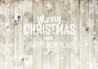 Image showing Merry Christmas Greeting On Wooden Fence Texture