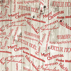 Image showing Christmas Words Pattern On Wooden Texture. Vector