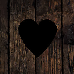 Image showing Heart symbol on wooden texture.